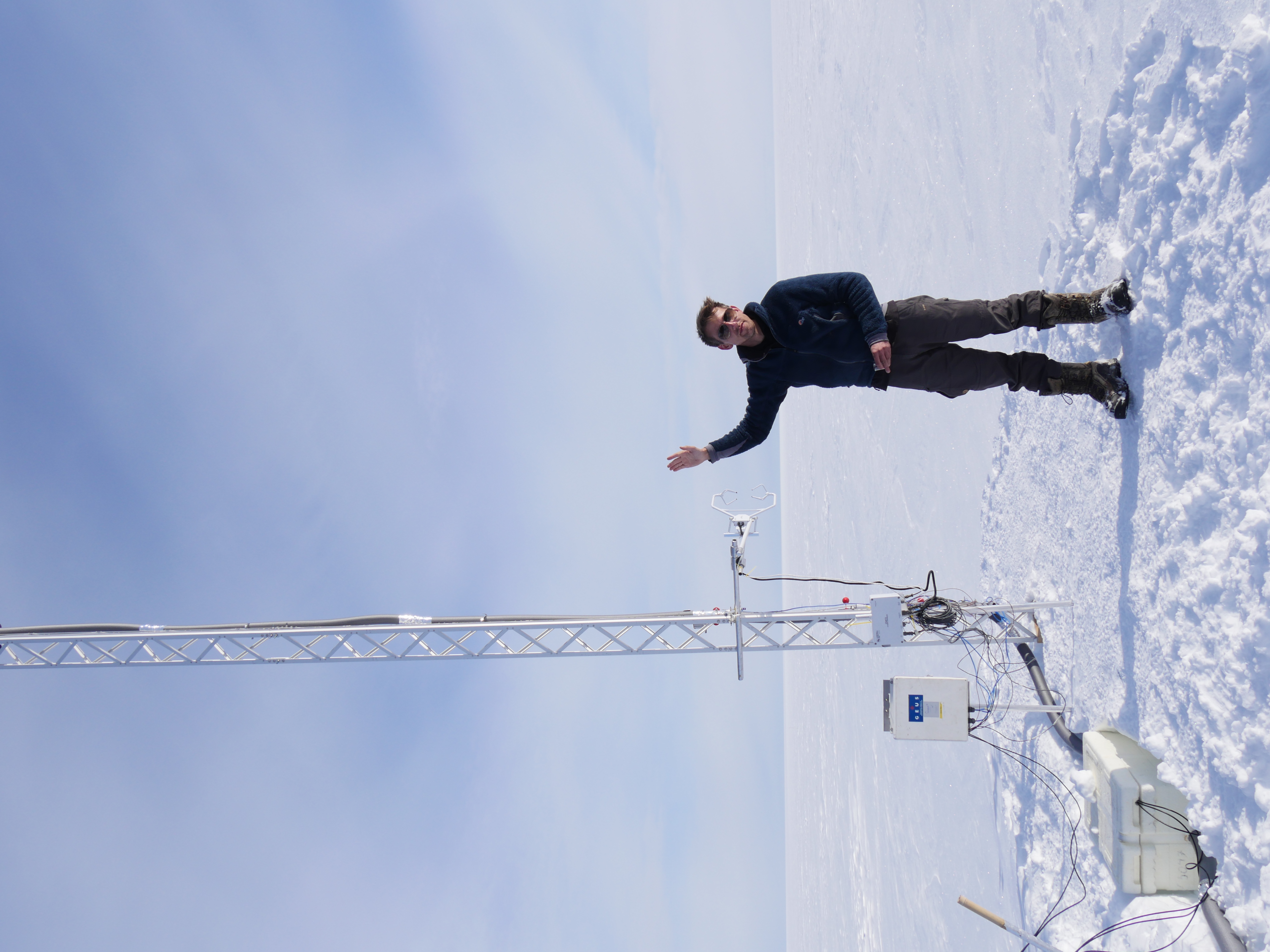 HC presenting the sampling tower next to the vapour tent. The tower has vapour inlets feeding a Picarro laser-absorption cavity-ring-down spectrometre for   isotope measurements and a sonic anemometer.
