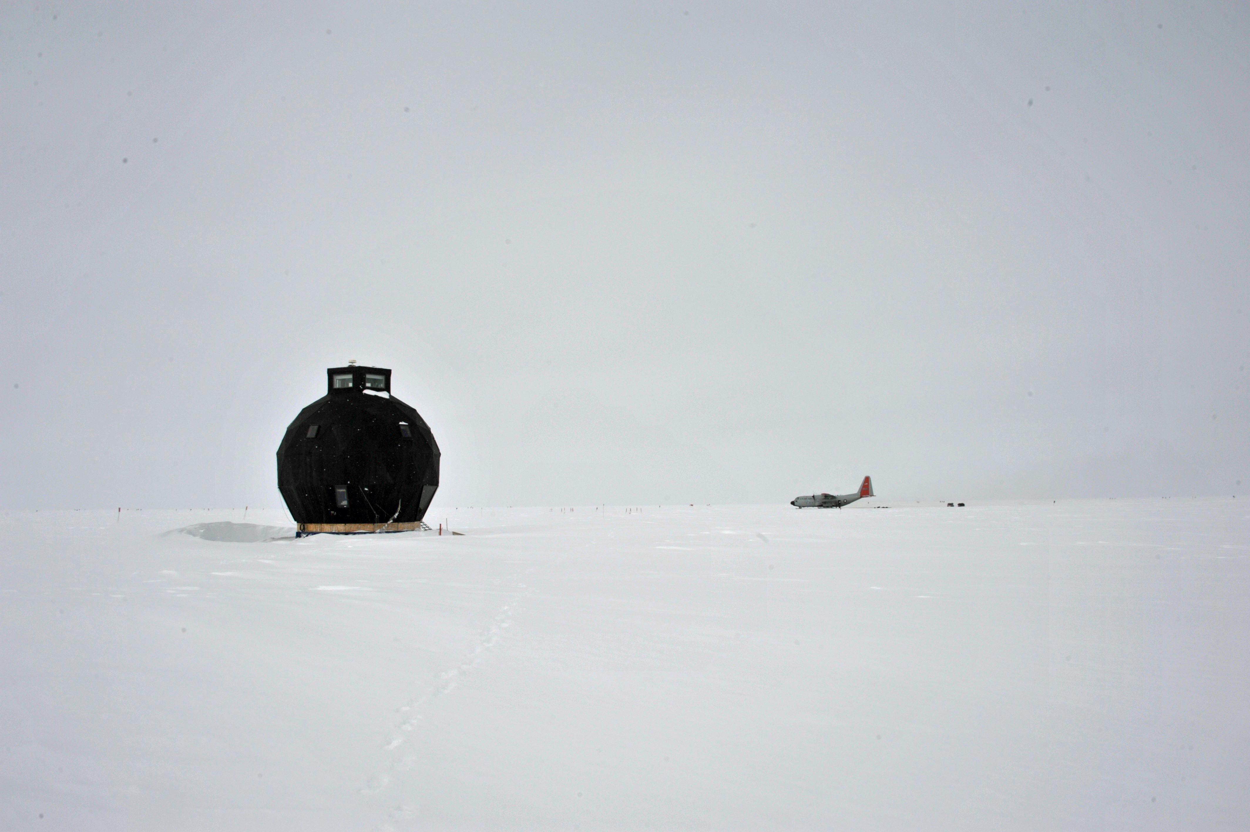 The dome majestically stands surrounded by a circular snow dune. Round structures do not collect as much drifting snow as square buildings