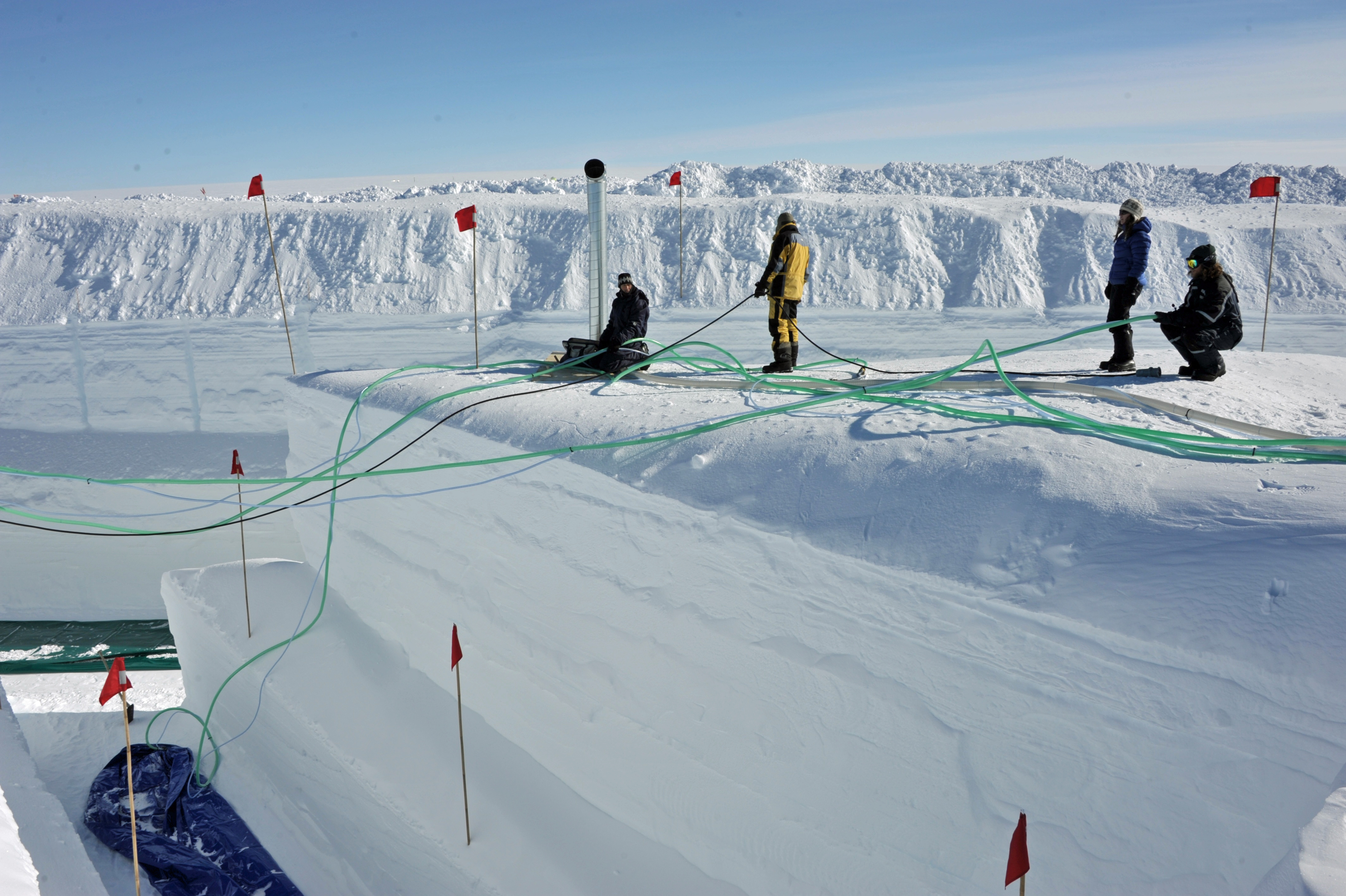 An intricate set of hoses are being laid out