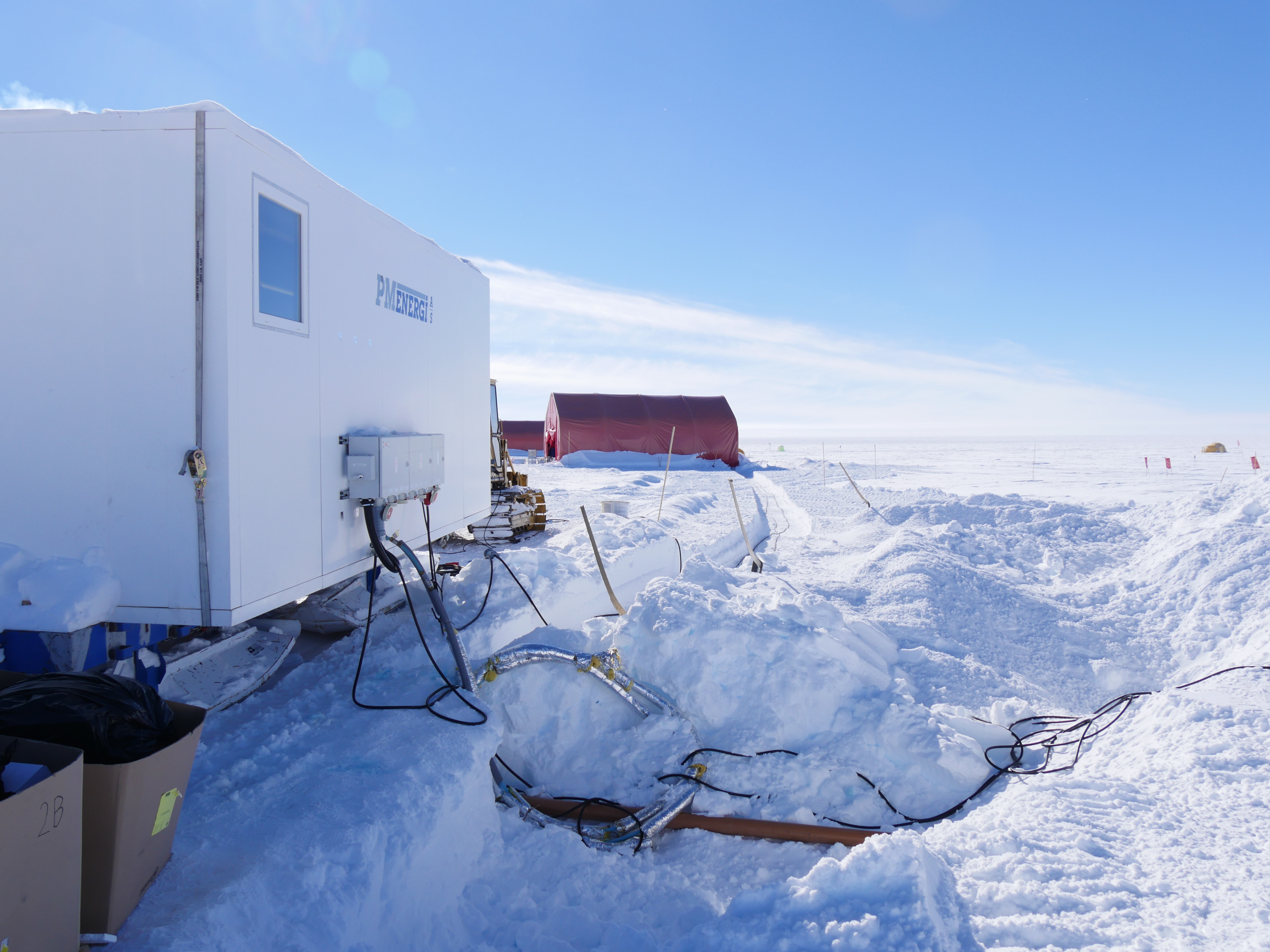 The generator delivers electricity to camp and the excess heat warms up the dome and melts water for showers and the kitchen.